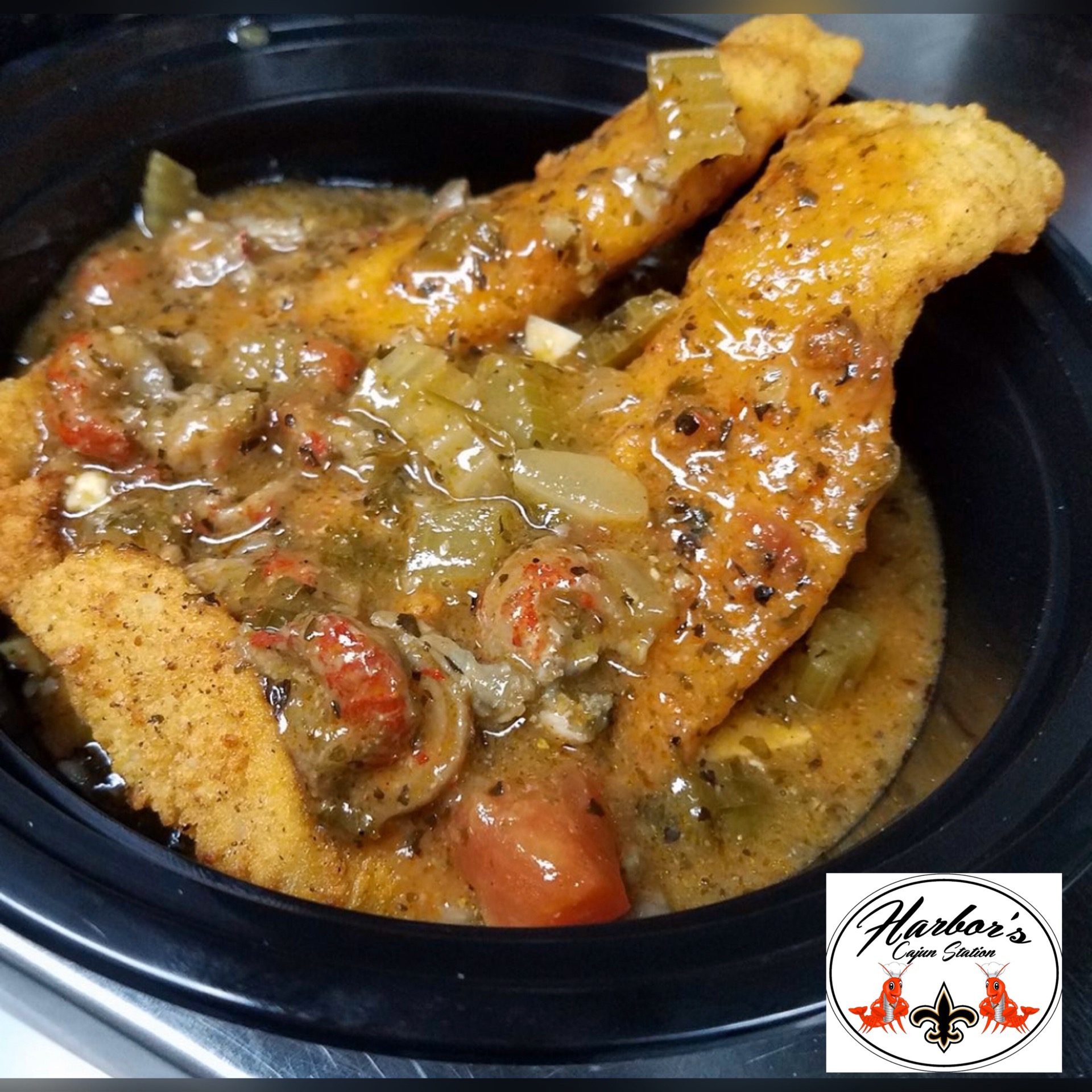 Fried Catfish Topped with crawfish Etouffee